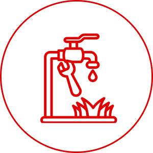 Red outline of faucet above grass.